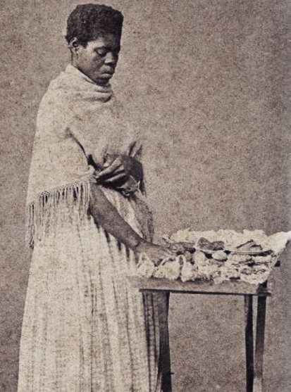 Mulher na condição de escrava de ganho vendedora, 1864-1865.